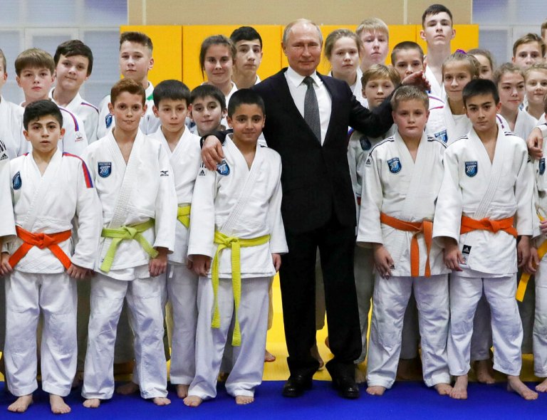 International Judo Federation strips Putin of titles and role as honorary president