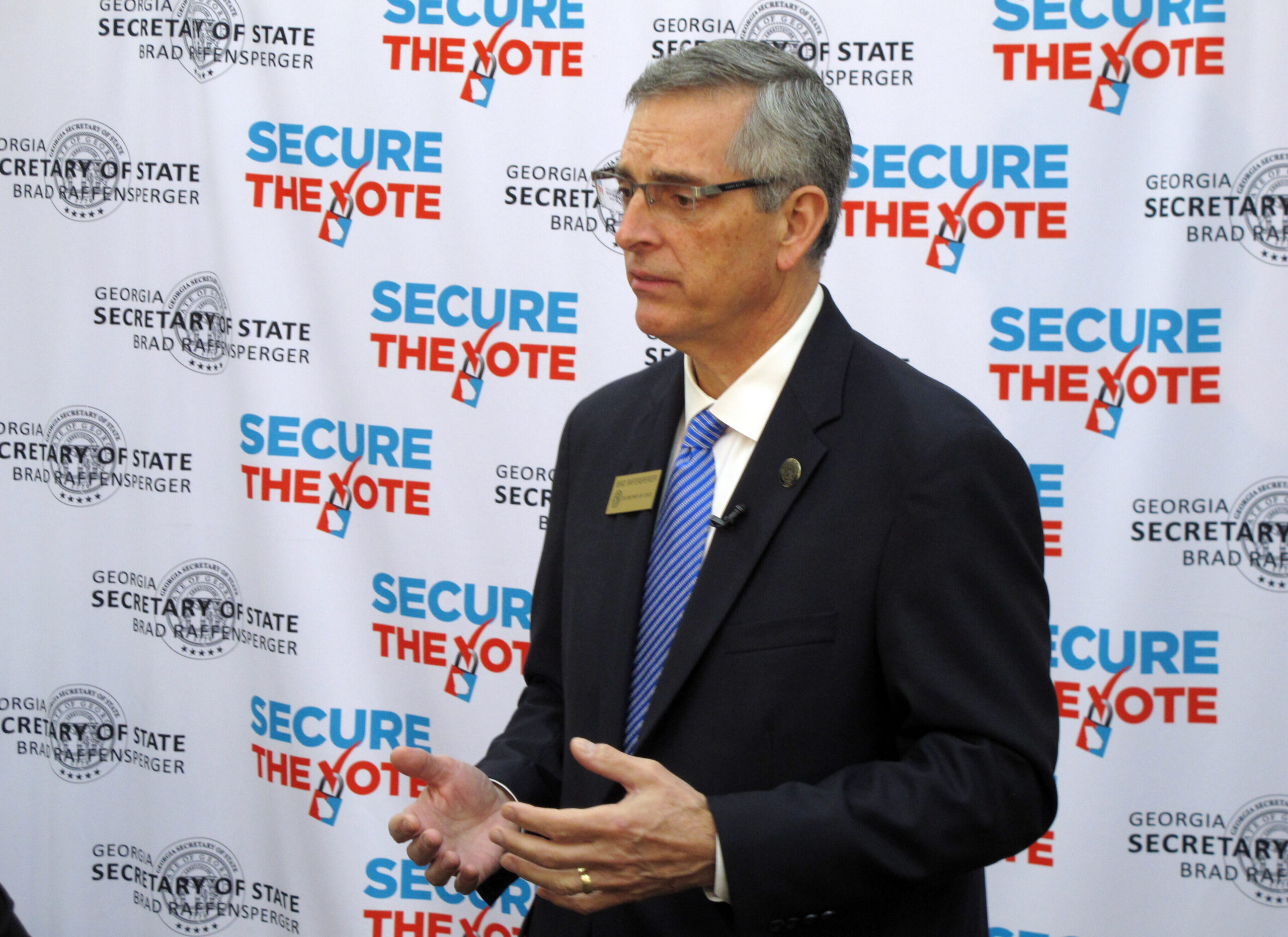 Georgia secretary of state claims top Republicans are pressuring him to toss legal ballots