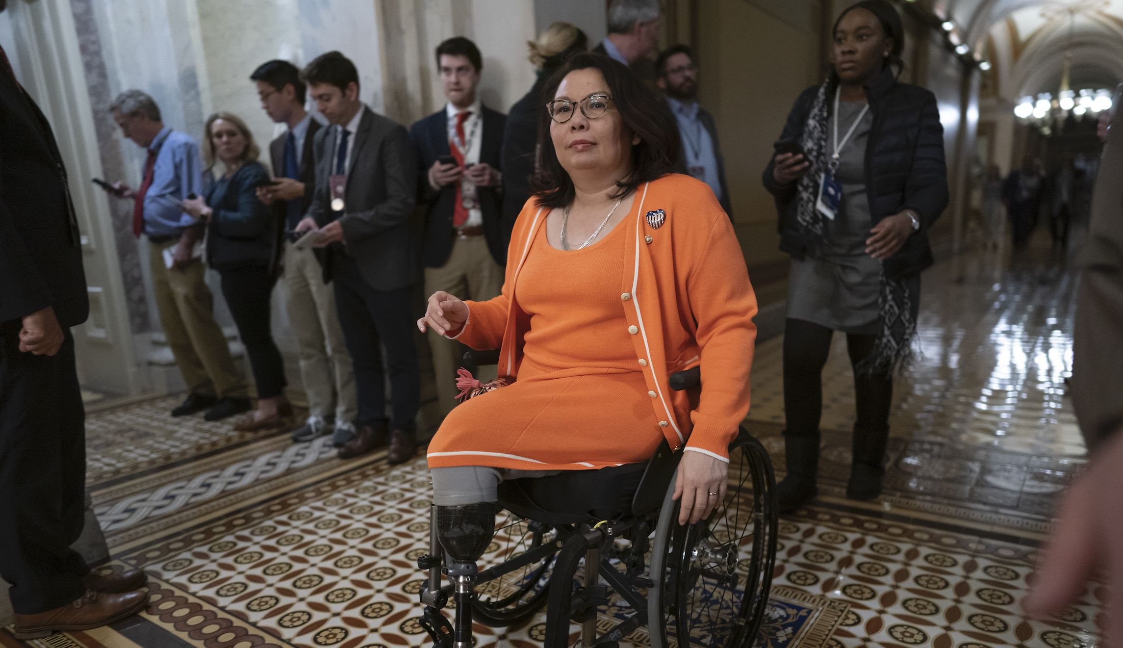 ‘Walk a mile in my legs’: Tammy Duckworth condemns Tucker Carlson for questioning her patriotism