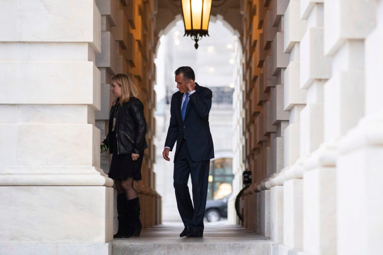 Sen. Mitt Romney, R-Utah, right, departs after the impeachment acquittal of President Donald Trump, on Capitol Hill, Wednesday, Feb. 5, 2020 in Washington.