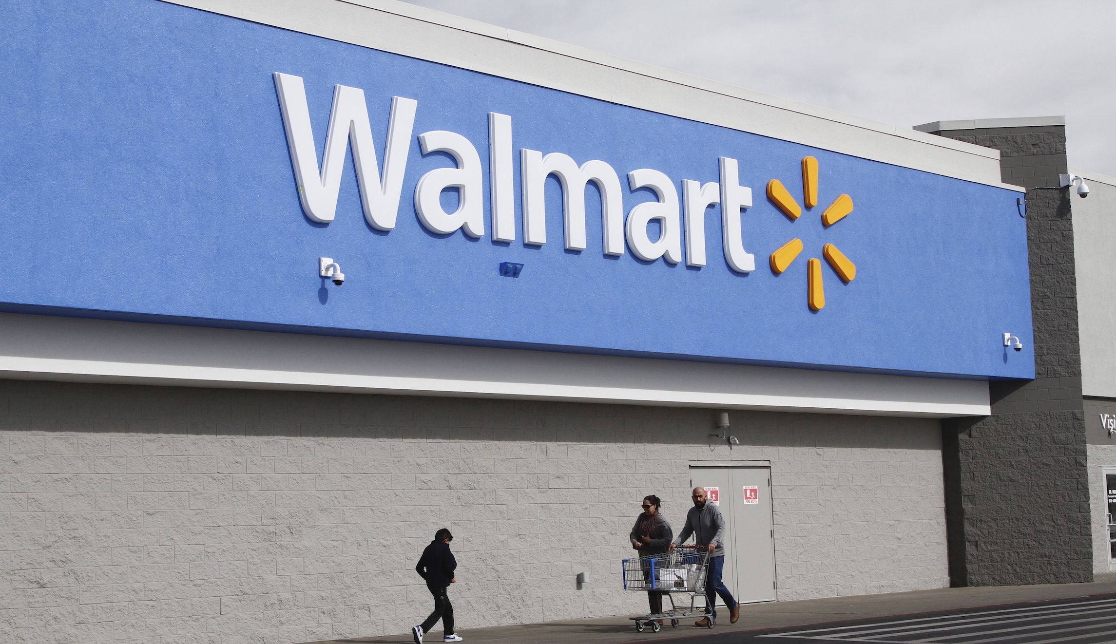 Two police officers wounded and gunman killed in Arkansas Walmart shooting
