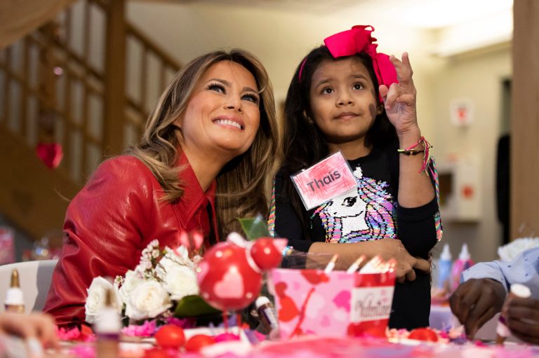 First lady Melania Trump talks to Thais Fernandez Carranza, 8, of Lima, Peru, during a Valentine's Day visit to Children's Inn at National Institutes of Health, Friday, Feb. 14, 2020, in Bethesda, Md. A new survey finds that she is a key reason why GOP women support the president.