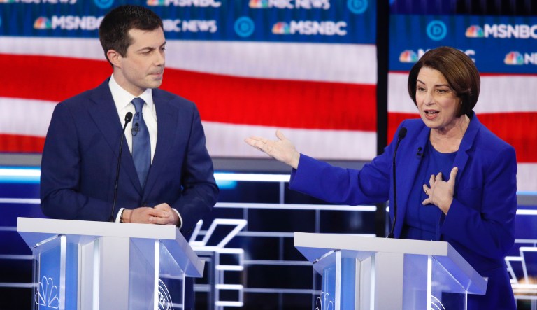 Democratic presidential candidates, Sen. Amy Klobuchar, D-Minn., right, speaks as former South Bend Mayor Pete Buttigieg looks on during a Democratic presidential primary debate Wednesday, Feb. 19, 2020, in Las Vegas, hosted by NBC News and MSNBC.