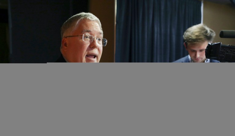 In this Nov. 1, 2018, file photo, Patrick Morrisey speaks to reporters after a debate in Morgantown, West Virginia. 