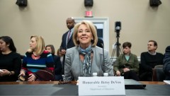 Unions target Betsy DeVos as she defends children