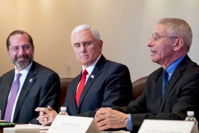 National Institute for Allergy and Infectious Diseases Director Dr. Anthony Fauci, right, accompanied by Vice President Mike Pence, center, and Health and Human Services Secretary Alex Azar, left, speaks during a Coronavirus Task Force Meeting at the Department of Health and Human Services, Thursday, Feb. 27, 2020, in Washington.