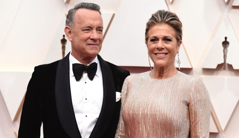 In this Feb. 9, 2020 file photo, Tom Hanks, left, and Rita Wilson arrive at the Oscars at the Dolby Theatre in Los Angeles.