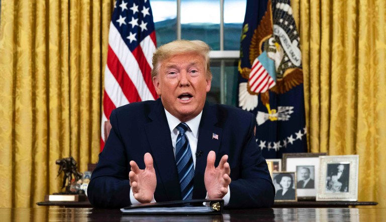President Donald Trump speaks in an address to the nation from the Oval Office at the White House about the coronavirus Wednesday, March, 11, 2020, in Washington.