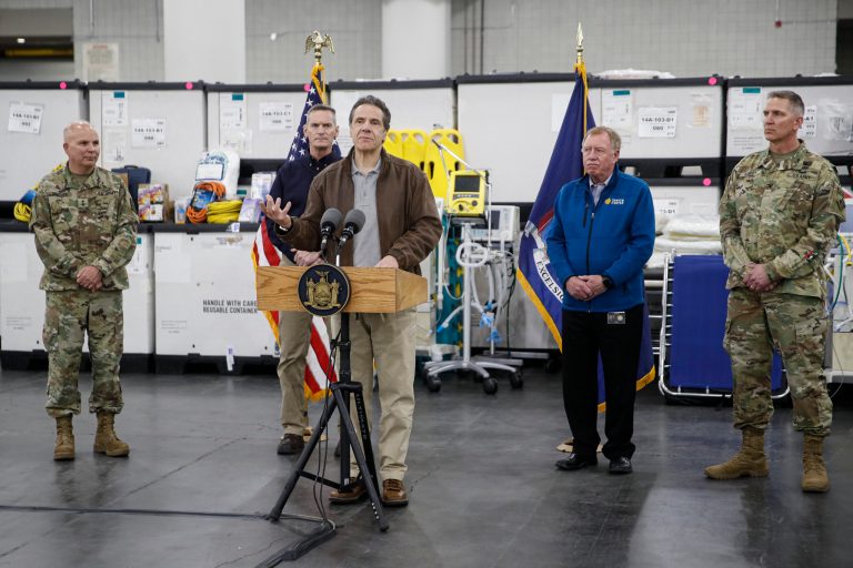 New York Gov. Andrew Cuomo speaks during a news conference alongside the National Guard at the Jacob Javits Center that will house a temporary hospital in response to the COVID-19 outbreak, Monday.