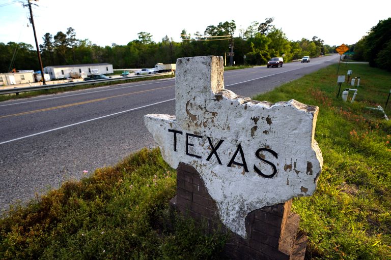 A Texas welcome sign is shown on March 29, 2020, in Deweyville, Texas, near the Louisiana state border. 
