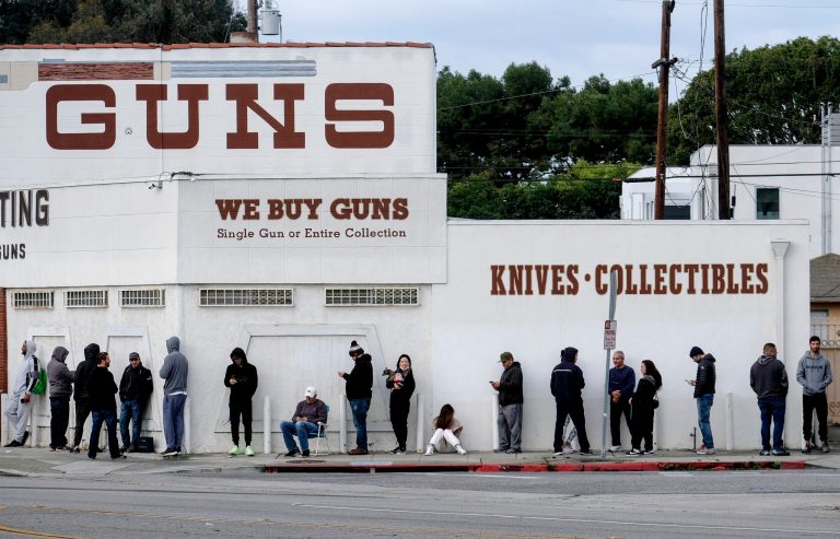 This photo is from March, but new FBI figures show that the line of people waiting to enter the gun store in Culver City, Calif. is likely longer today.