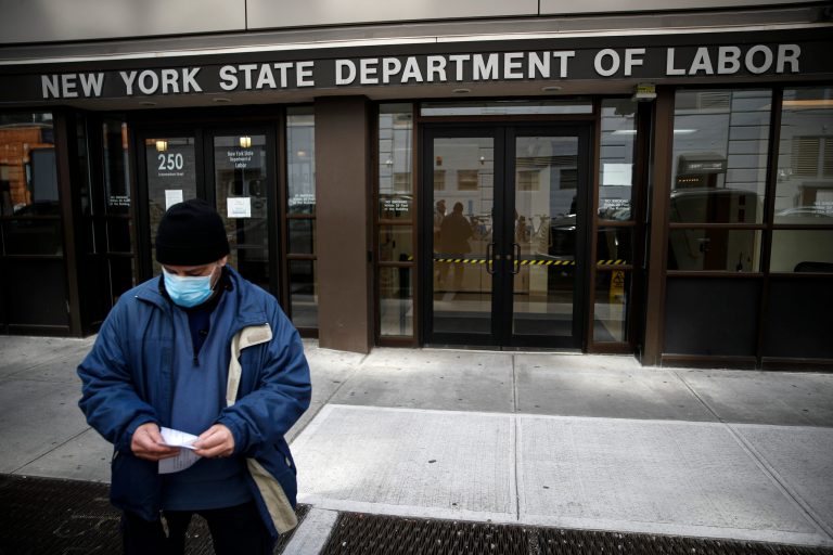 Visitors to the Department of Labor are turned away at the door by personnel due to closures over coronavirus concerns in New York. Americans are seeking unemployment benefits at unprecedented levels due to the coronavirus.