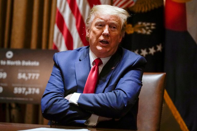 President Donald Trump speaks during a Cabinet Room meeting Wednesday. A poll shows most Americans do not blame him for unemployment.