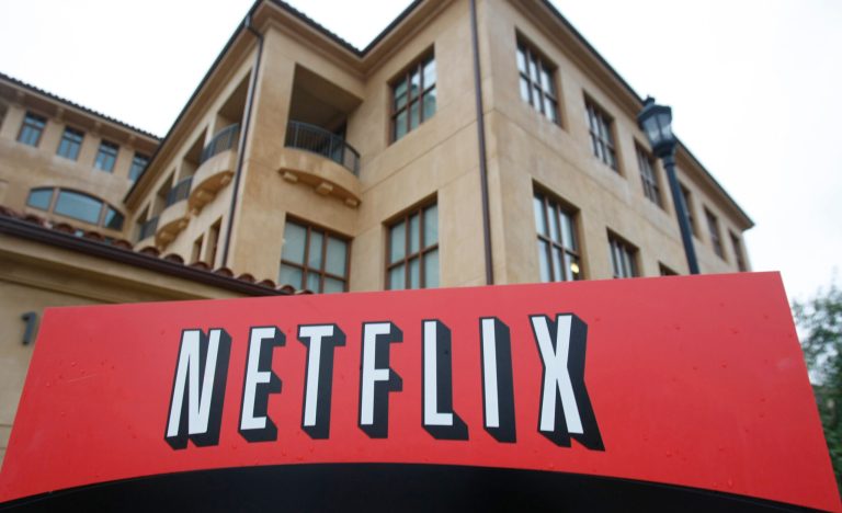 This file photo shows the company logo and view of Netflix headquarters in Los Gatos, California. Netflix announced on Tuesday, May 23, 2023, that it would begin assessing a password-sharing fee to limit viewers to the same household.