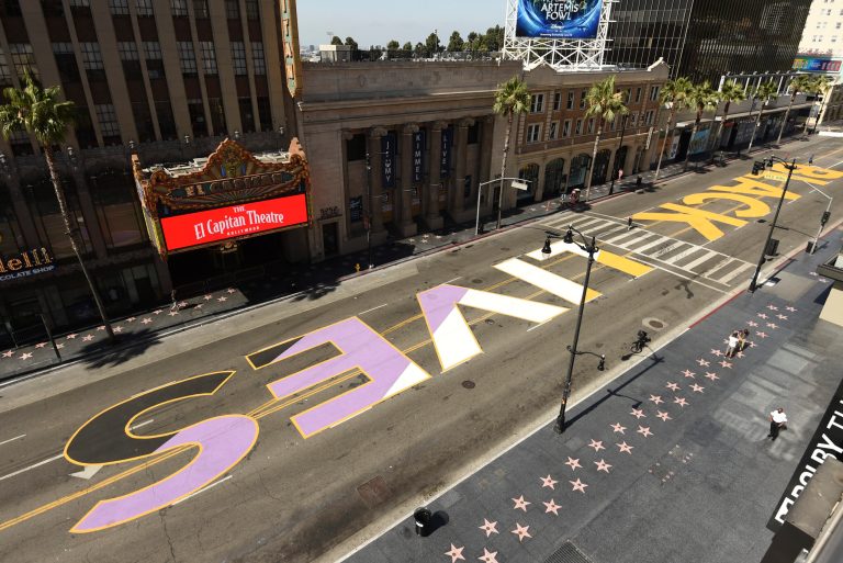 Large letters spelling out "Black Lives Matter" remain on Hollywood Blvd. As cities move to endorse the movement, media are also changing, with many outlets deciding to capitalize "Black."