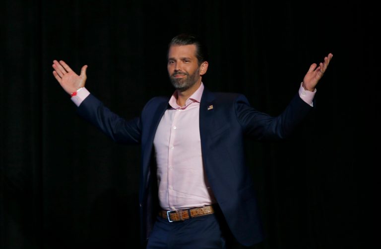 Donald Trump Jr. reacts to the crowd as he comes on stage to speak prior to his father, President Donald Trump speaking at the Students for Trump conference at Dream City Church, Tuesday, June 23, 2020, in Phoenix. Trump supporters do not like the "cancel culture," like today's Twitter restrictions on Don Jr.'s account.