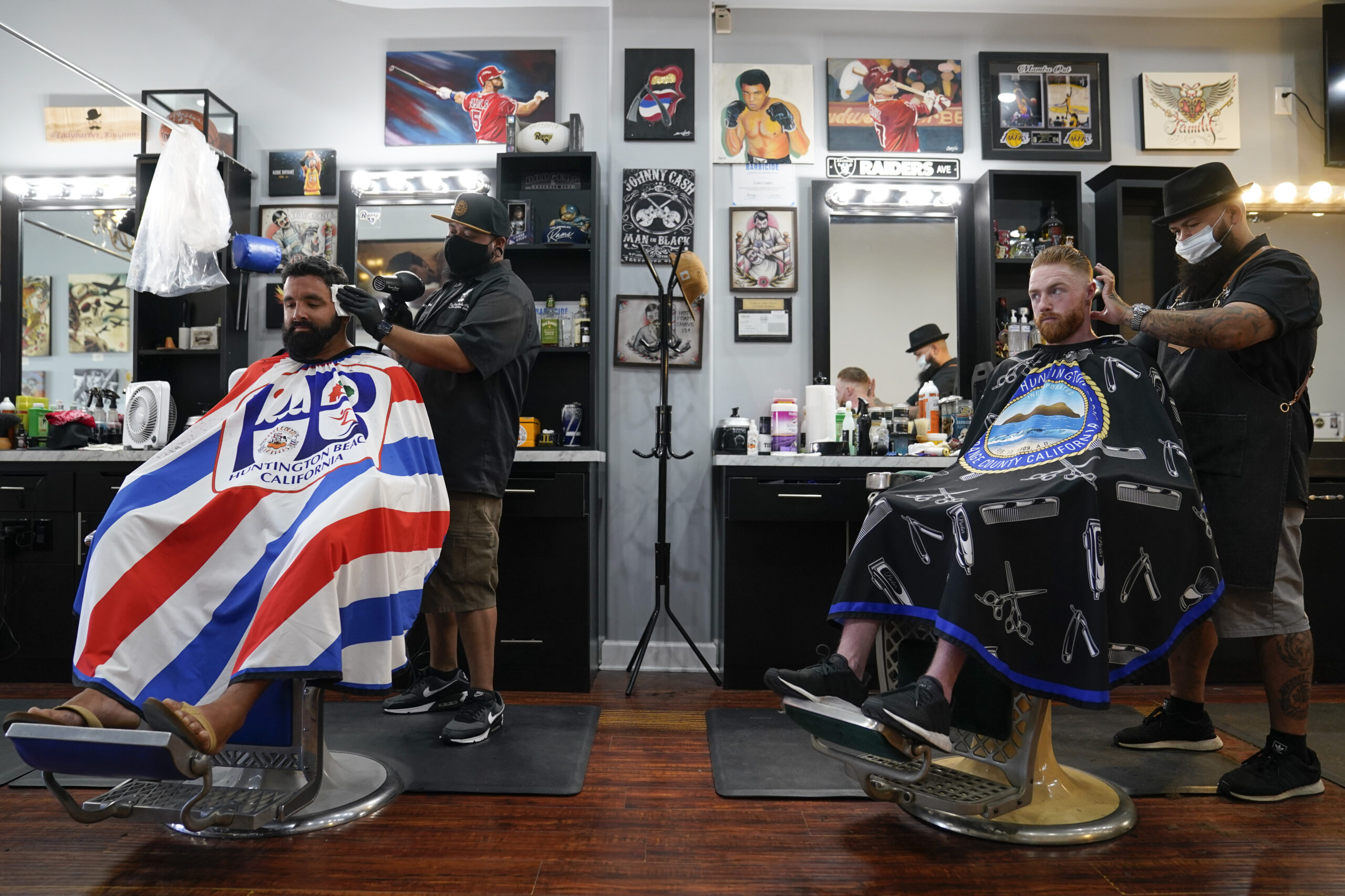 California barbers and salons can see clients, but only outside