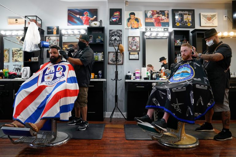 California barbers and salons can see clients, but only outside