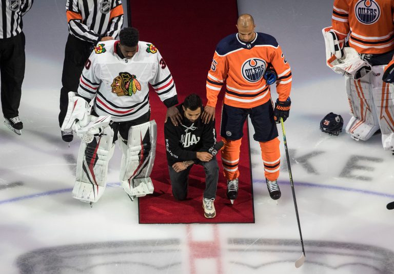 ‘Wasn’t a sign of disrespect’: First NHL player to kneel during national anthem says he will raise his fist in protest instead