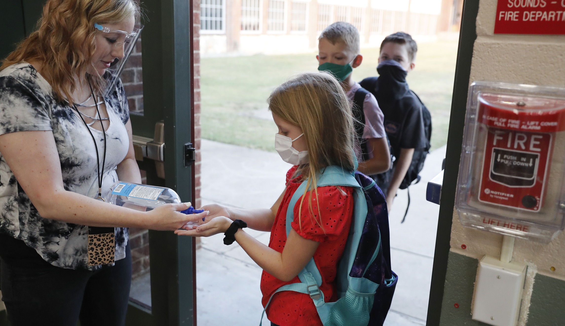 Requirement that Texas schoolchildren wear masks remains subject of debate across state