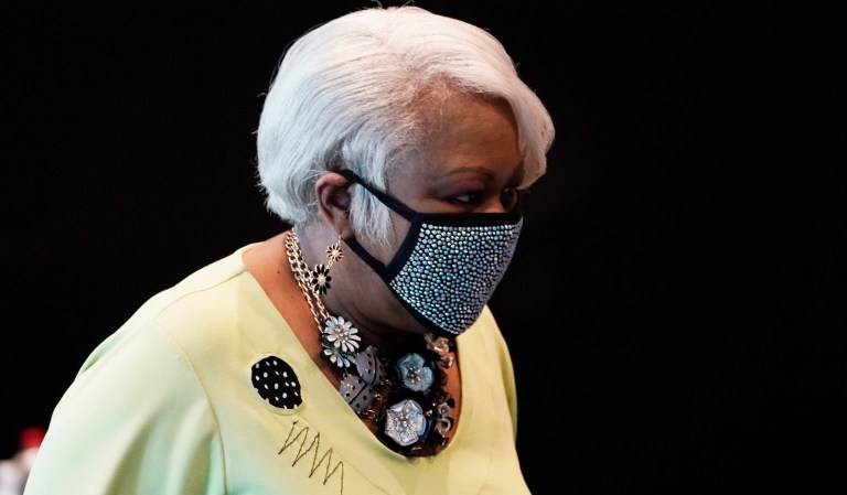 Virginia state Sen. Louise Lucas, D-Portsmouth, arrives for the Virginia Senate Special Session in the temporary Senate chambers at the Science Museum of Virginia Tuesday Aug. 18, 2020, in Richmond, Va. Authorities say Lucas has been charged with two felonies for her alleged involvement in the damaging of a large Confederate monument during protests in the city of Portsmouth.