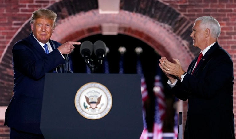 President Donald Trump joins Vice President Mike Pence on stage after Pence spoke on the third day of the Republican National Convention at Fort McHenry National Monument and Historic Shrine in Baltimore, Wednesday, Aug. 26, 2020. 