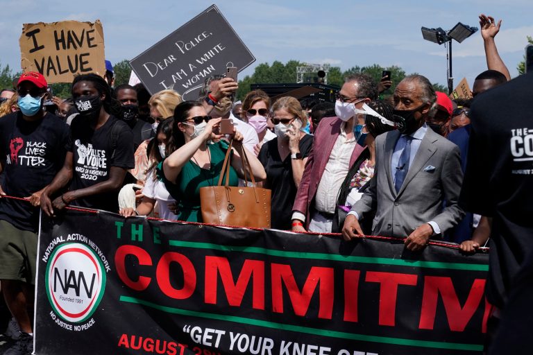 Rev. Al Sharpton prepares to march from the Lincoln Memorial to the Martin Luther King Jr. Memorial during the March on Washington, Friday Aug. 28, 2020, in Washington.