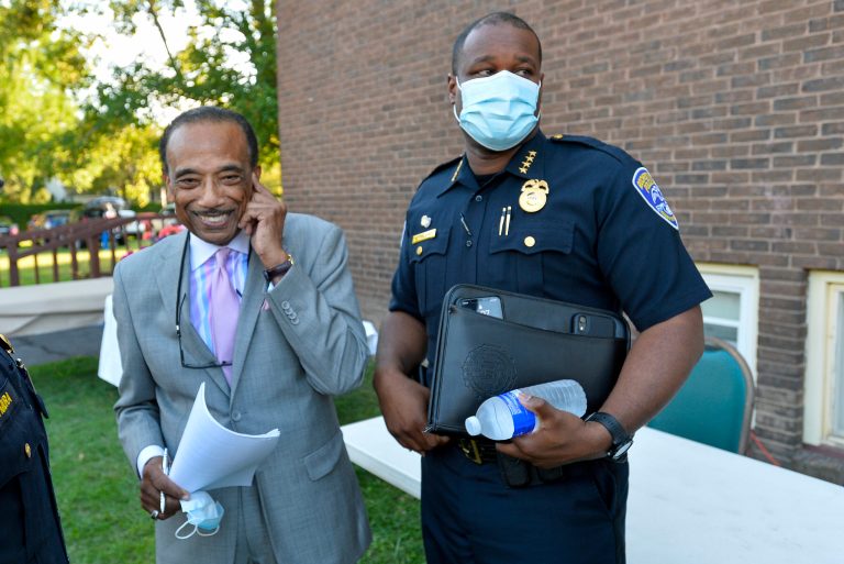 Rochester Police Chief La'Ron Singletary, right, stands with Reverend Lewis W. Stewart, left, of the United Christian Leadership Ministry before a community meeting in Rochester, N.Y., on Thursday, Sept. 3, 2020. 