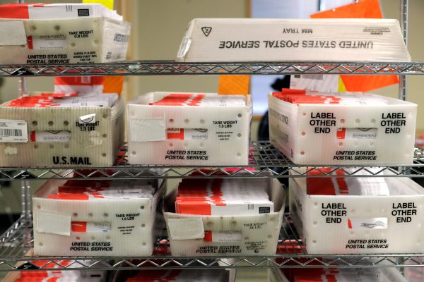 Federal judge rules Postal Service must prioritize election mail