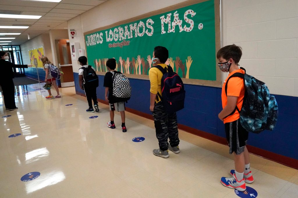 Some Illinois schools make plans to send students back to classrooms