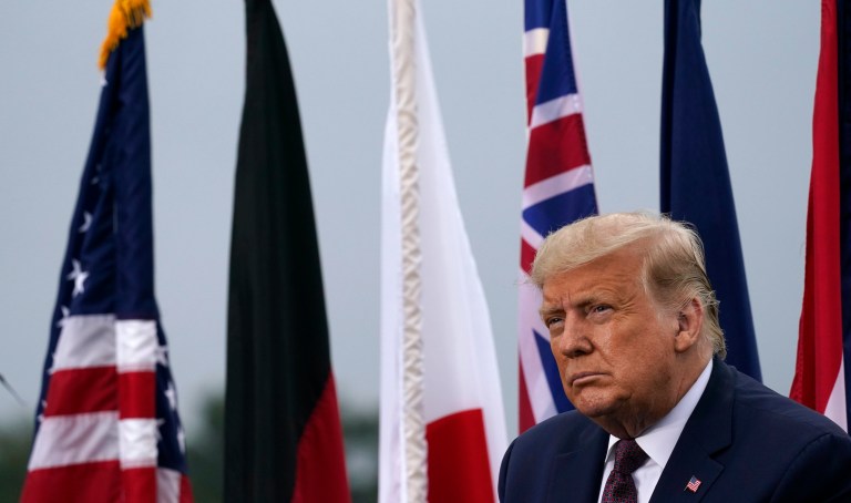 President Donald Trump listens during a 19th anniversary observance of the Sept. 11 terror attacks, at the Flight 93 National Memorial in Shanksville, Pa., Friday, Sept. 11, 2020. 