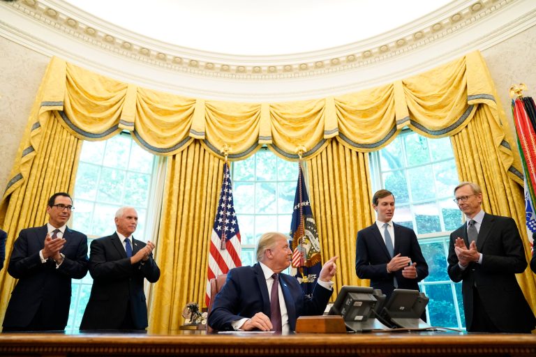 President Donald Trump speaks in the Oval Office of the White House on Friday, Sept. 11, 2020, in Washington. Bahrain has become the latest Arab nation to agree to normalize ties with Israel as part of a broader diplomatic push by Trump and his administration to fully integrate the Jewish state into the Middle East. From left, Treasury Secretary Steven Mnuchin, Vice President Mike Pence, Trump, Jared Kushner and U.S. special envoy for Iran Brian Hook.