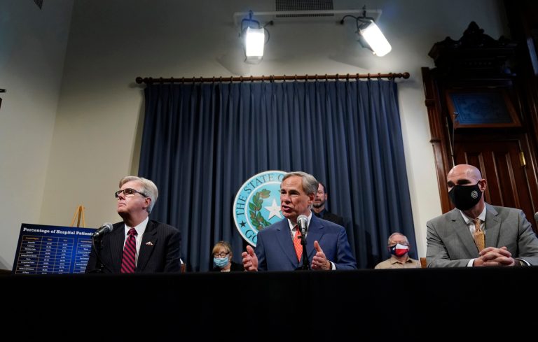 Lt. Gov. Dan Patrick, left, Texas Gov. Greg Abbott, and Speaker Dennis Bonnen, right, attend a news conference where they provided an update to Texas's response to COVID-19, Thursday, Sept. 17, 2020, in Austin, Texas. 