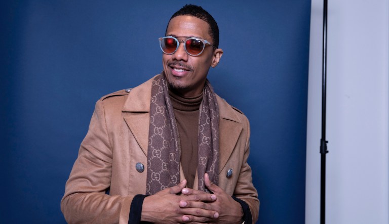 In this Dec. 10, 2018, photo, Nick Cannon poses for a portrait in New York to promote promoting his new show, "The Masked Singer." Cannon turns 40 on Oct. 8. 