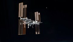 Space junk delays scheduled repairs to International Space Station