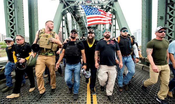 Proud Boys and QAnon followers face identity crisis and turn on Trump