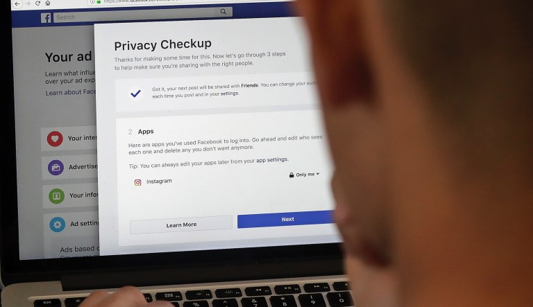 This March 26, 2018 file photo shows a computer with Facebook ad preferences pages in San Francisco. Proposition 24 on California's November ballot seeks to expand California's consumer privacy law by tripling penalties for companies that break laws regarding the collection and sale of children's private information. It would also create a state agency to enforce consumer privacy protections.