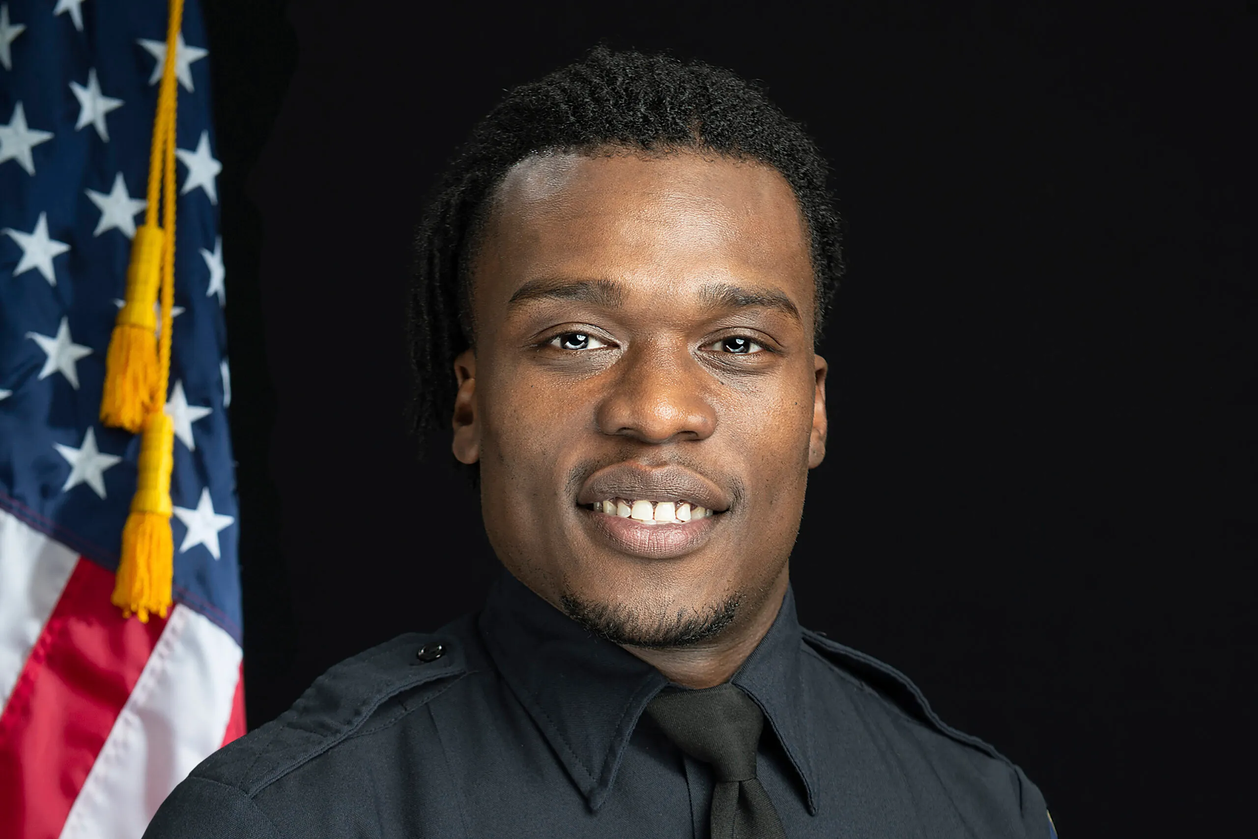 Protests erupt after grand jury declines to charge black police officer in shooting black man