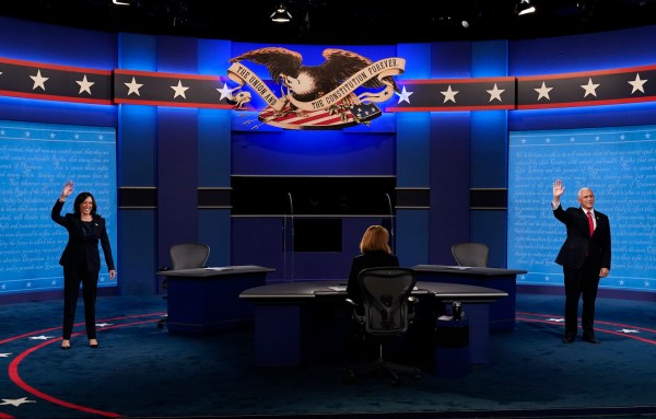 Pence and Harris strike calmer tone than presidential debate but sharply contest the issues