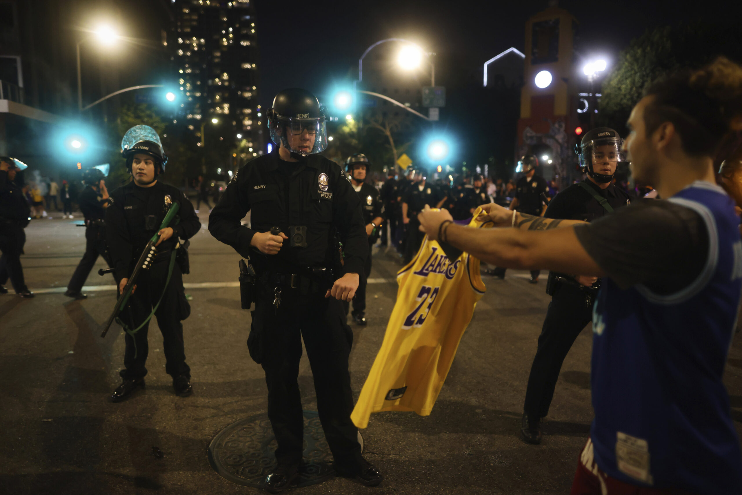 NBA fans reportedly targeted police officers following Lakers title win: ‘Throwing beer bottles’ and other ‘projectiles’