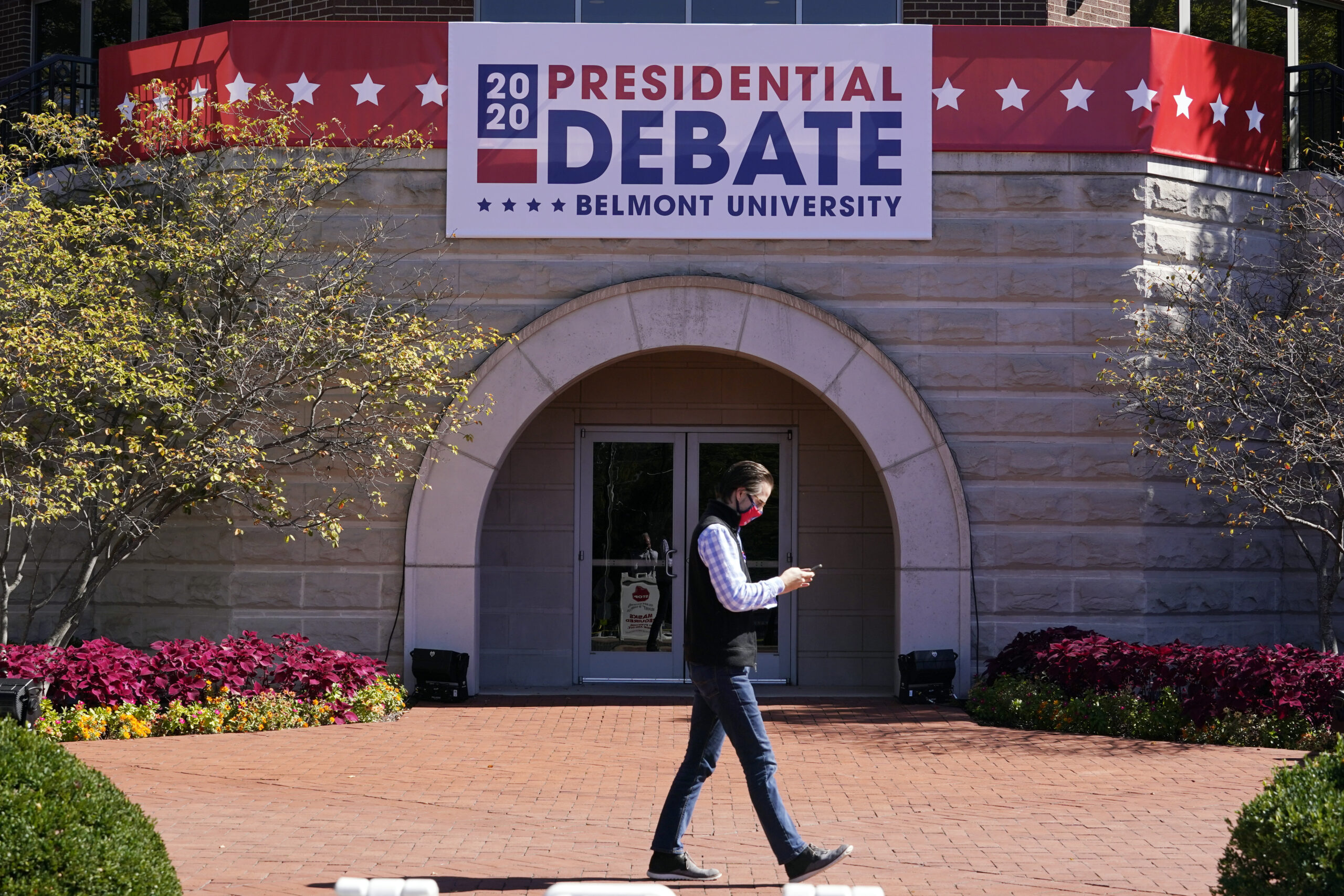Candidates warned debate stage, hall not safe from COVID