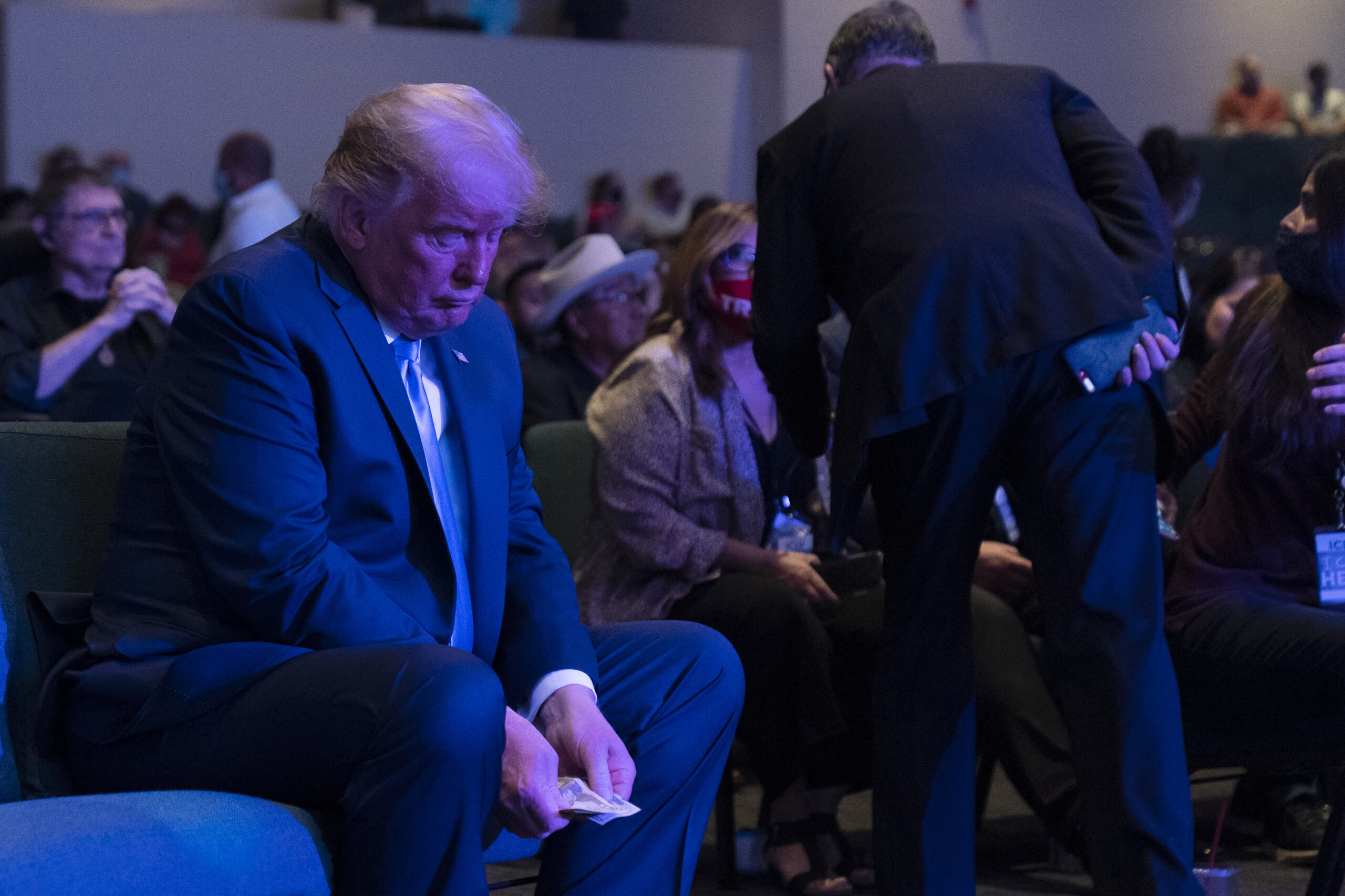 Trump spotted putting handful of $20 bills in donation bucket of Las Vegas church