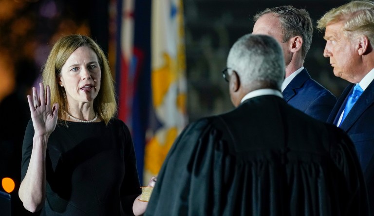 Amy Coney Barrett sworn in at Supreme Court by John Roberts