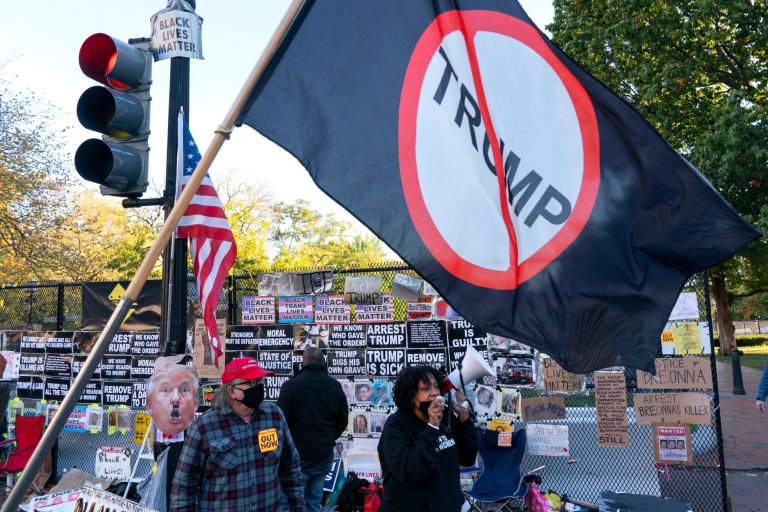 People protest against President Donald Trump, Friday, Oct. 30, 2020, in front of the White House. Nearly 30% of Joe Biden's voters actually voted to dump Trump.