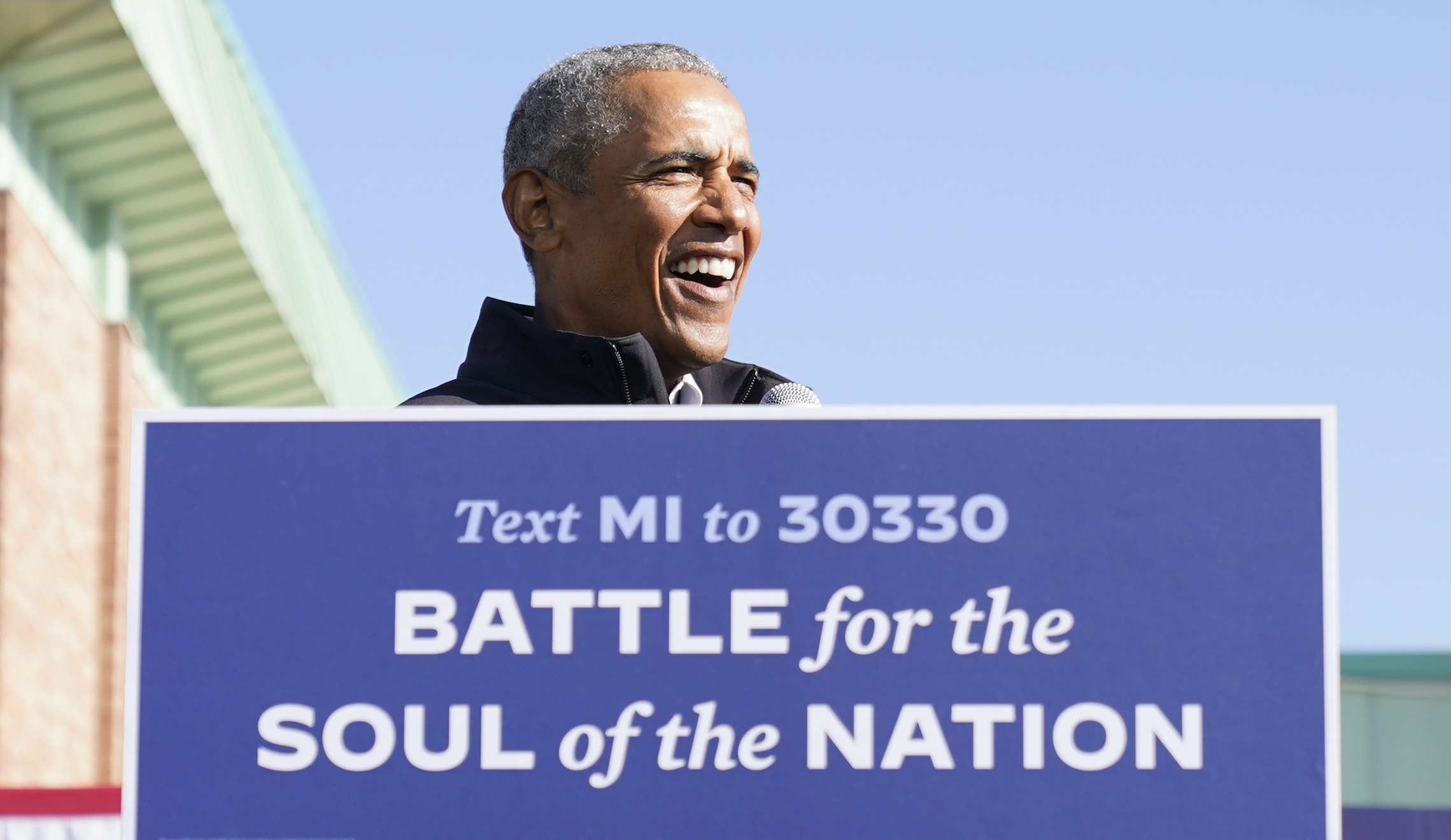 Obama skewers Trump’s ‘definition of manliness’ campaigning with Biden in Michigan