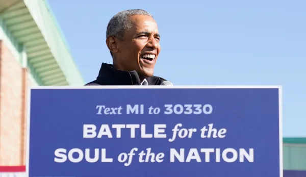 Obama skewers Trump’s ‘definition of manliness’ campaigning with Biden in Michigan