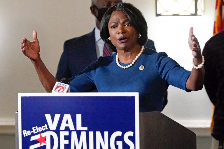 WATCH: Val Demings security team pushes video tracker to the ground