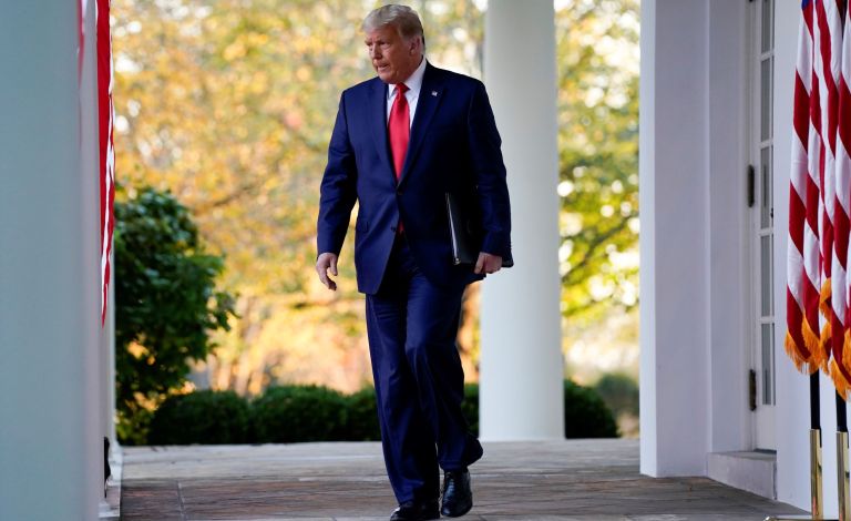 President Donald Trump arrives to speak in the Rose Garden of the White House, Friday, Nov. 13, 2020, in Washington.