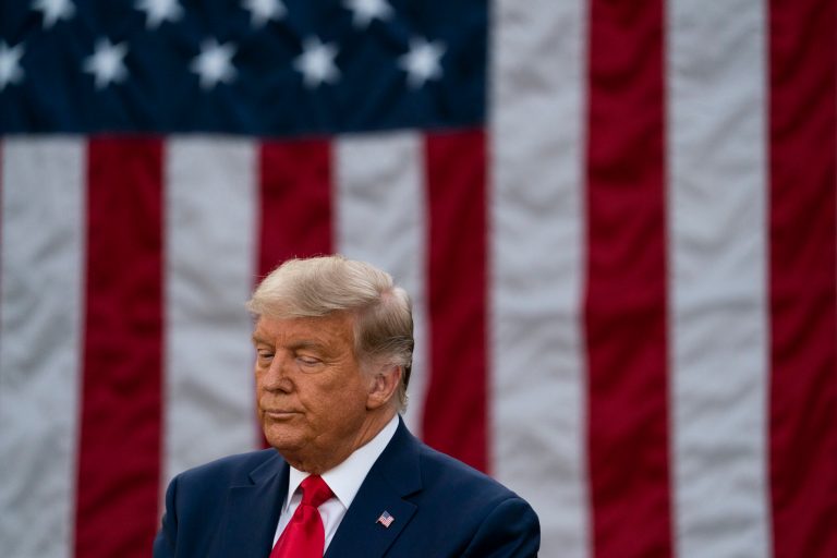 President Donald Trump listens during an event on the coronavirus in the Rose Garden of the White House Friday.