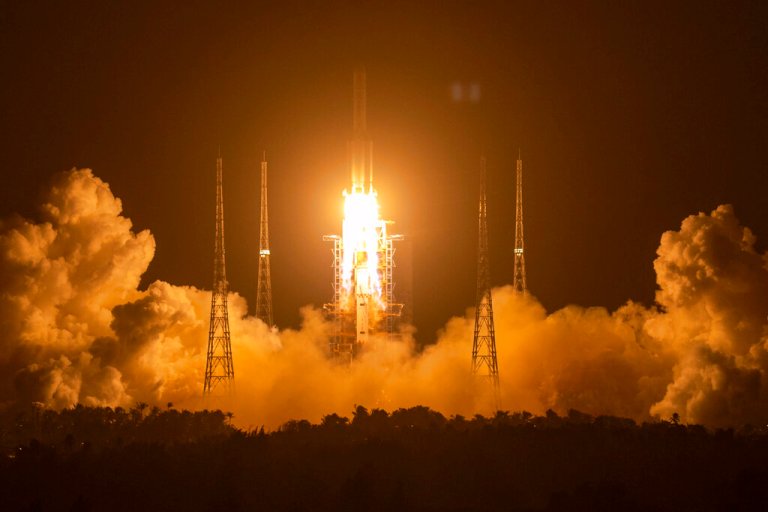 A Long March-5 rocket carrying the Chang'e 5 lunar mission lifts off.